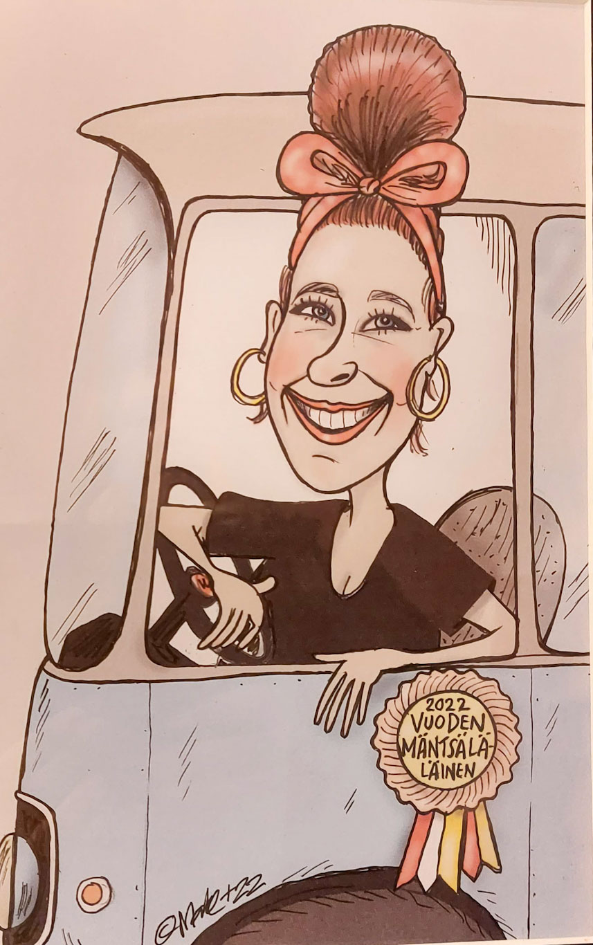 Mervi paikallisen pilapiirtäjän Maken kuvaamana.